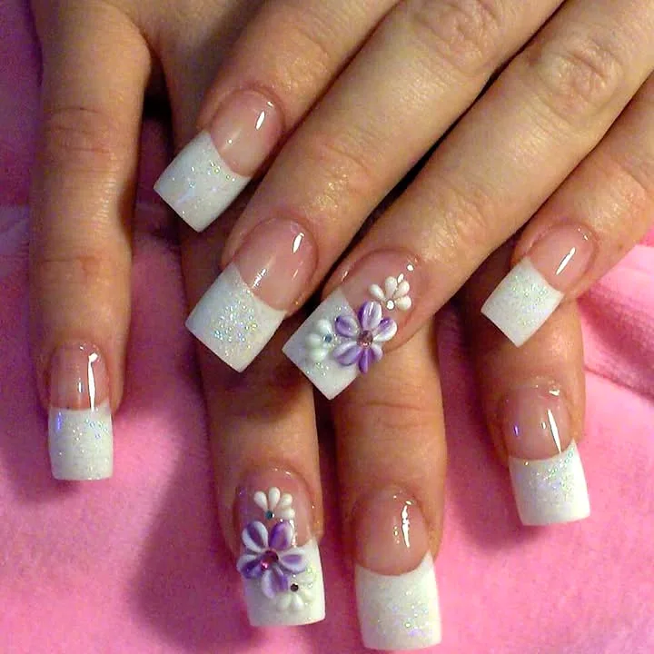 White glitter French tips with purple flower nail art